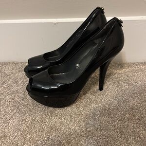 Stuart Weitzman Diplille Peep-Toe Platform Pump in black patent leather